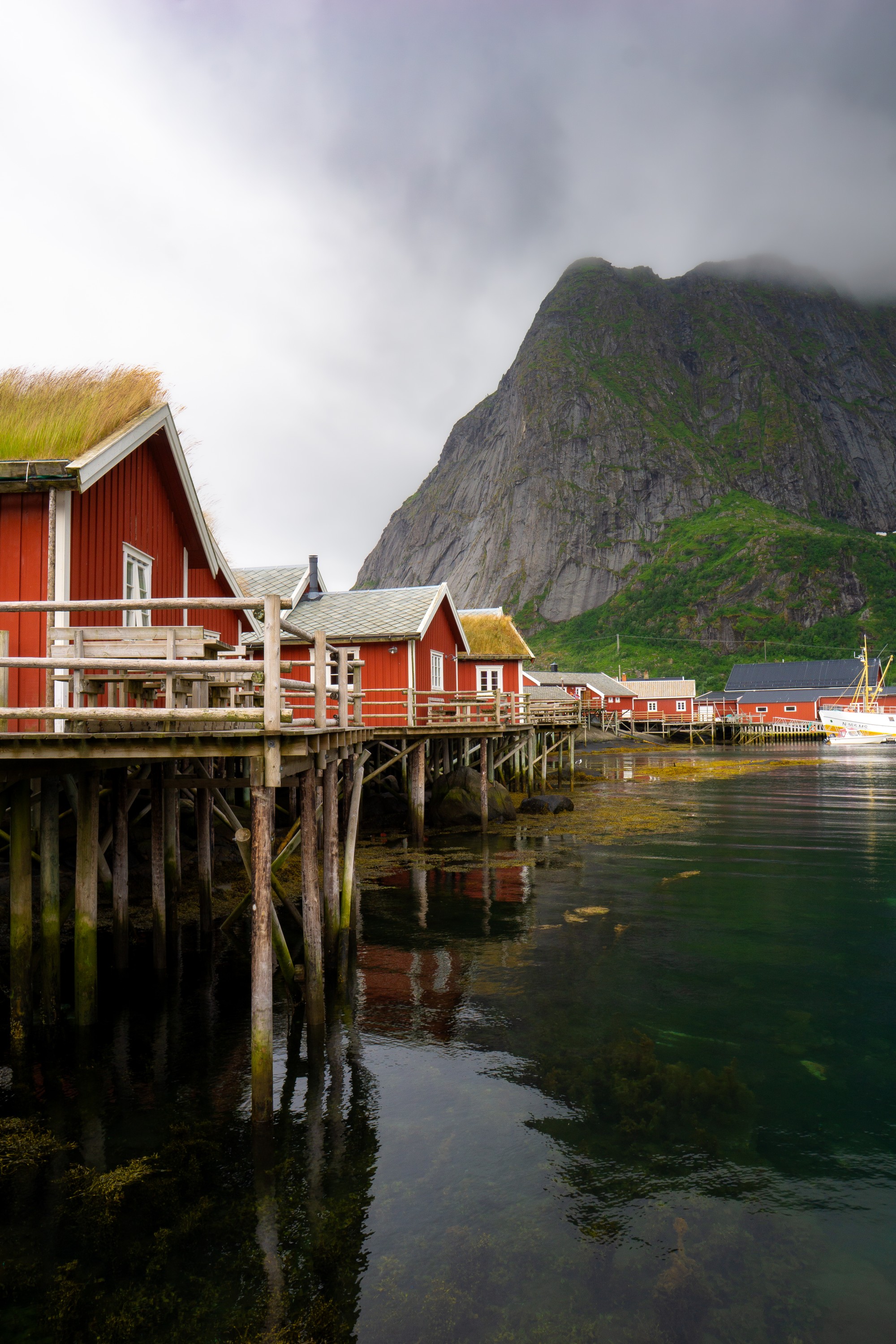 Red Cabins at the Fjord’s Edge — Lofoten Islands, Norway